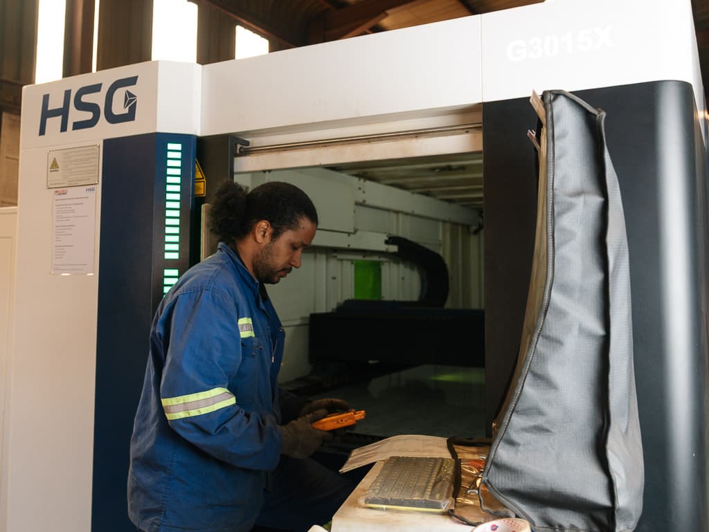 The fibre laser cutting cell in the workshop