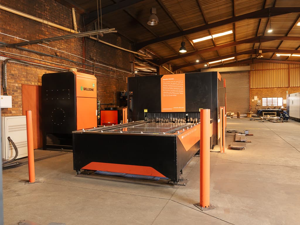 The laser cutting bed and extraction system