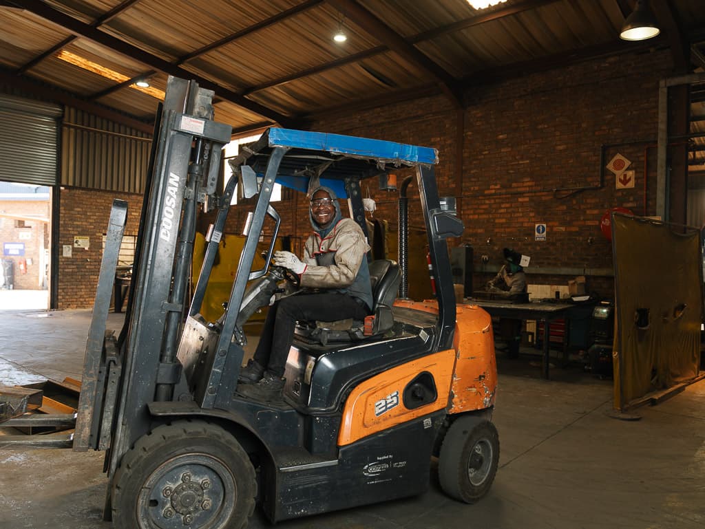 Forklift and fabrication work on the Foxtron floor