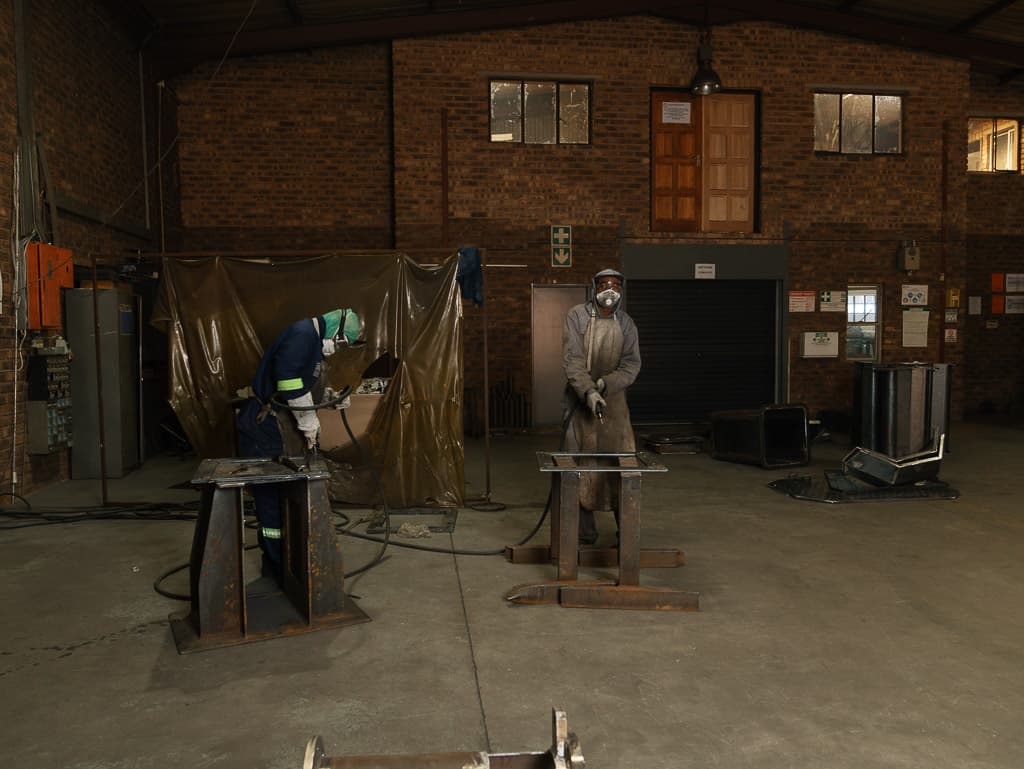 Fabrication in progress across the workshop